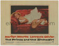 2f844 PRINCE & THE SHOWGIRL LC #6 '57 sexiest Marilyn Monroe smiling on red couch in feathers!
