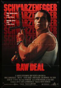 2g695 RAW DEAL 1sh '86 great image of tough guy Arnold Schwarzenegger with gun!