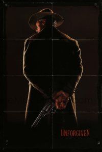 2g891 UNFORGIVEN teaser 1sh '92 image of gunslinger Clint Eastwood w/back turned, undated design!