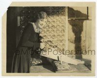 2s142 BILLIE DOVE 8x10 still '25 getting surprise birthday cake cut w/ saw while making Air Mail!