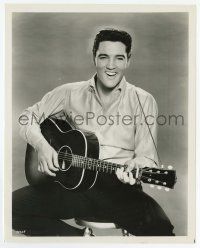 2s300 ELVIS PRESLEY 8x10.25 still '50s smiling & playing his guitar seated on a stool!