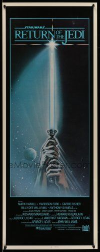 2y369 RETURN OF THE JEDI int'l insert '83 George Lucas, art of hands holding lightsaber by Reamer!