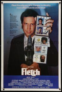 2z249 FLETCH advance 1sh '85 Michael Ritchie, wacky detective Chevy Chase has gun pulled on him!