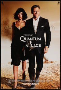 2z611 QUANTUM OF SOLACE int'l advance DS 1sh '08 Craig & Kurylenko, burning building & brown sky!