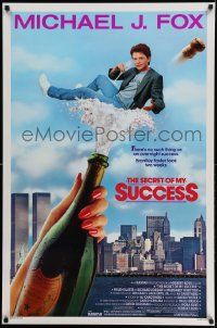 2z674 SECRET OF MY SUCCESS 1sh '87 wacky image of Michael J. Fox & huge bottle of champagne!
