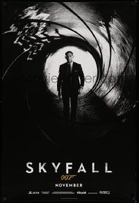 2z698 SKYFALL November teaser DS 1sh '12 Daniel Craig as James Bond standing in classic gun barrel!