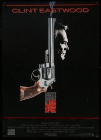 3b121 DEAD POOL German '88 Clint Eastwood as tough cop Dirty Harry, cool smoking gun image!