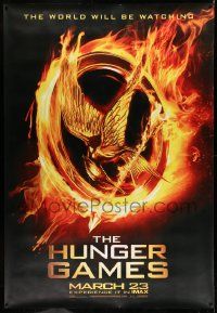 3c306 HUNGER GAMES DS bus stop '12 Jennifer Lawrence, world will be watching, flaming phoenix logo!