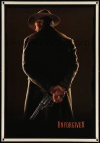 3f393 UNFORGIVEN linen teaser 1sh '92 gunslinger Clint Eastwood w/back turned, undated design!
