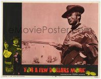 3k067 FOR A FEW DOLLARS MORE LC #8 '67 great c/u of Clint Eastwood holding rifle smoking cigar!