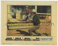 3k037 RIO BRAVO LC #6 '59 c/u of John Wayne & Ricky Nelson in gunfight on street, Howard Hawks