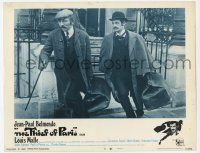 3k953 THIEF OF PARIS LC #8 '67 directed by Louis Malle, Jean-Paul Belmondo on street w/ huge bag!