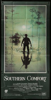 3p043 SOUTHERN COMFORT English 3sh '81 Walter Hill, Keith Carradine, cool image of hunter in swamp!