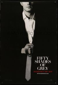 3r618 FIFTY SHADES OF GREY teaser DS 1sh '15 Jamie Dornan in the title role holding tie!