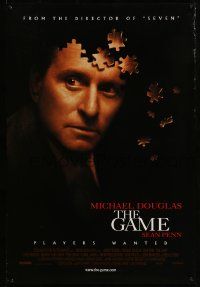 3r687 GAME int'l 1sh '97 cool image of Michael Douglas partly made of puzzle pieces!
