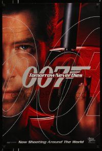 3s819 TOMORROW NEVER DIES teaser DS 1sh '97 close-up of Pierce Brosnan as James Bond 007!