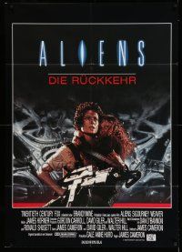 3y364 ALIENS German 33x47 '86 James Cameron, Sigourney Weaver as Ripley holding Carrie Henn!