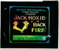 4a017 BACK FIRE glass slide '22 art of Jack Hoxie as Lightning Carson being handcuffed by sheriff!
