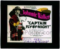 4a039 CAPTAIN FLY-BY-NIGHT glass slide '22 Johnnie Walker as mysterious highwayman in gaucho suit!