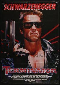 4r722 TERMINATOR German '85 close up of most classic cyborg Arnold Schwarzenegger with gun!
