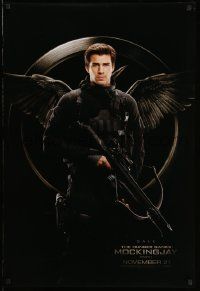 4w428 HUNGER GAMES: MOCKINGJAY - PART 1 teaser DS 1sh '14 image of Liam Hemsworth as Gale!