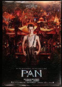 4z286 PAN DS bus stop '15 Levi Miller in the title role over a colorful, busy background!