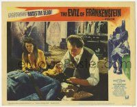 5c643 EVIL OF FRANKENSTEIN LC #3 '64 Katy Wild is puzzled by Peter Cushing working on his monster!