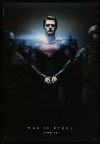 5g585 MAN OF STEEL teaser DS 1sh '13 Henry Cavill in the title role as Superman handcuffed!