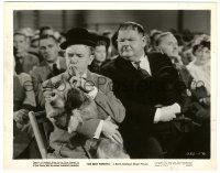 5m120 AIR RAID WARDENS 8x10.25 still '43 Oliver Hardy watches Stan Laurel shush his dog at meeting!