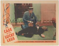 5w575 CASE OF THE LUCKY LEGS LC '35 Warren William as Perry Mason kneeling by murder victim!