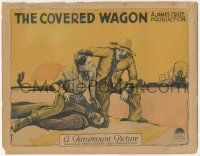 5w598 COVERED WAGON LC '23 Ernest Torrence lifts J. Warren Kerrigan off of Alan Hale in desert!