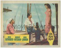 5w651 FIRE DOWN BELOW LC '57 Robert Mitchum & Jack Lemmon stare at Rita Hayworth on ship!