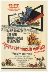 6d347 CIRCUS WORLD Cinerama herald '65 Claudia Cardinale, John Wayne, cool Frank McCarthy artwork!