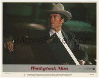 6j223 HONKYTONK MAN LC #6 '82 super close up of director/star Clint Eastwood holding guitar case!