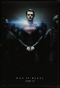 6r318 MAN OF STEEL teaser DS 1sh '13 Henry Cavill in the title role as Superman handcuffed!