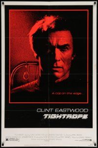 6y895 TIGHTROPE 1sh '84 Clint Eastwood is a cop on the edge, cool handcuff image!
