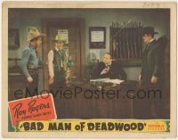 7c282 BAD MAN OF DEADWOOD LC '41 great image of Roy Rogers grabbing criminal by rewards posters!