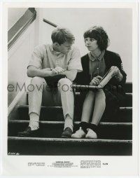 7d117 AMERICAN GRAFFITI 8x10.25 still '73 c/u of Ron Howard & Cindy Williams looking at yearbook!