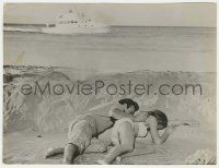 7d321 DR. NO 7.25x9.5 still '62 Sean Connery as James Bond & Ursula Andress taking cover on beach!