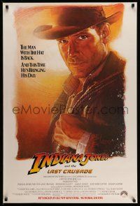 7g732 INDIANA JONES & THE LAST CRUSADE advance 1sh '89 Ford over a white background by Drew Struzan
