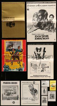 7h089 LOT OF 11 CUT PRESSBOOKS '60s-70s advertising images for a variety of different movies!