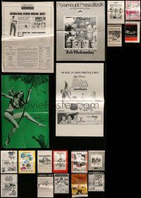 7h075 LOT OF 24 UNCUT PRESSBOOKS '50s-70s advertising images for a variety of different movies!