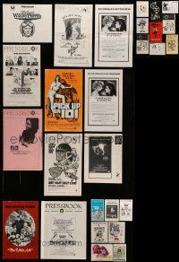 7h065 LOT OF 36 UNCUT PRESSBOOKS '70s advertising images for a variety of different movies!