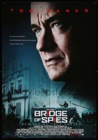 7w586 BRIDGE OF SPIES advance DS 1sh '15 great image of Tom Hanks, building of the Berlin Wall!
