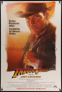 7w734 INDIANA JONES & THE LAST CRUSADE advance 1sh '89 Ford over a white background by Drew Struzan