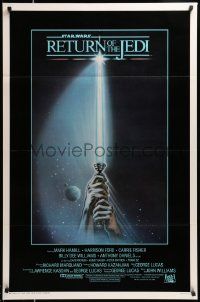 7w881 RETURN OF THE JEDI int'l 1sh '83 George Lucas, art of hands holding lightsaber by Tim Reamer!