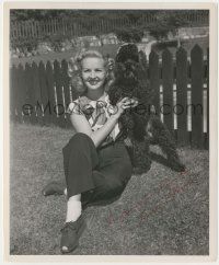 7x0694 BETTY GRABLE signed 8.25x10 still '30s smiling candid sitting with her poodle outside!