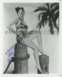 7x1243 GENE TIERNEY signed 8x10 REPRO still '80s full-length in sexy tropical swimsuit by palm tree!