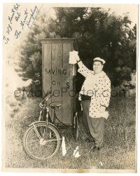 7x0750 GREAT HUMPHREY signed 8x10 still '40s asking people to buy U.S. Savings Bonds on his bike!