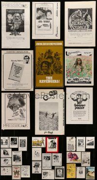 8a189 LOT OF 34 UNCUT PRESSBOOKS '70s advertising images for a variety of different movies!